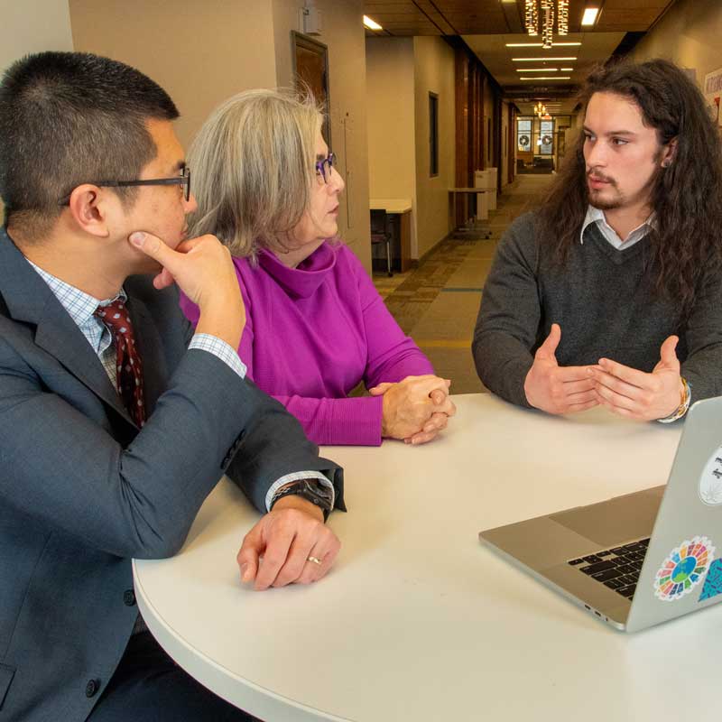 Y. Michael Chen and Mary Maher, talking with Ian Bankes