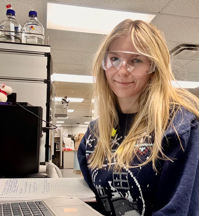 Lydia Coombs in lab, alumna of biochemistry major, biochemistry degree program, Nazareth University