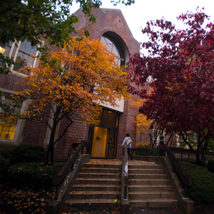 Trees with colorful fall foliage alongside Smyth Hall 