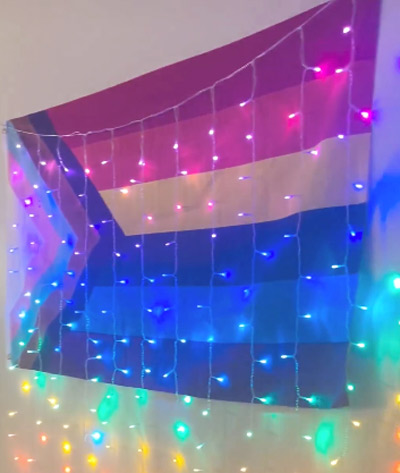 Multi-color flag and lights on Atlas Center wall