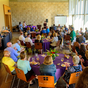 Event in Glazer lobby is an example of events planning at Nazareth University in Rochester, NY