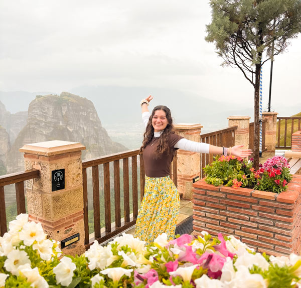 Isabelle Talley dancing in the rain on the top of a Meteora monastery in central Greece.