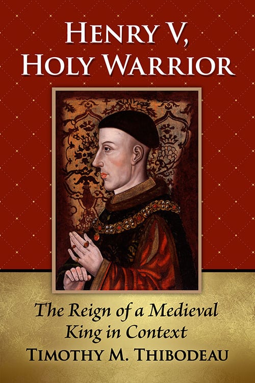 book cover of Henry V, Holy Warrior with photo of him in red robe and black hat, wearing rings