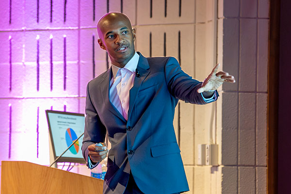 Kevin Graham speaks at a responsible AI conference at Nazareth