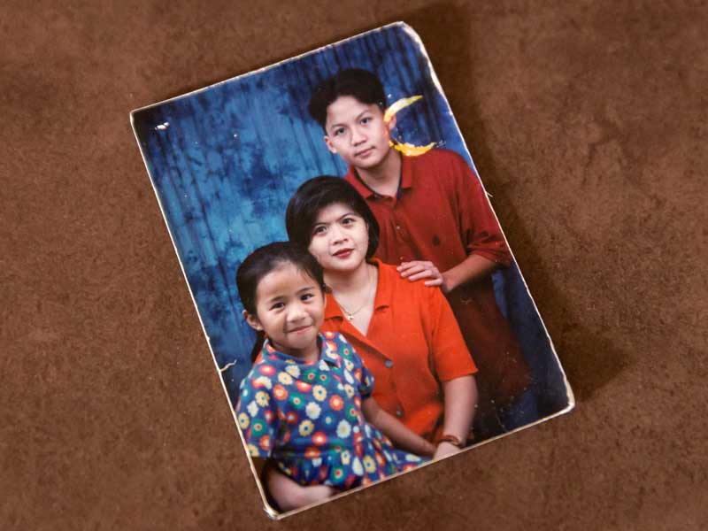 Joanna Parker as a child in the Philippines, with her mother and brother.