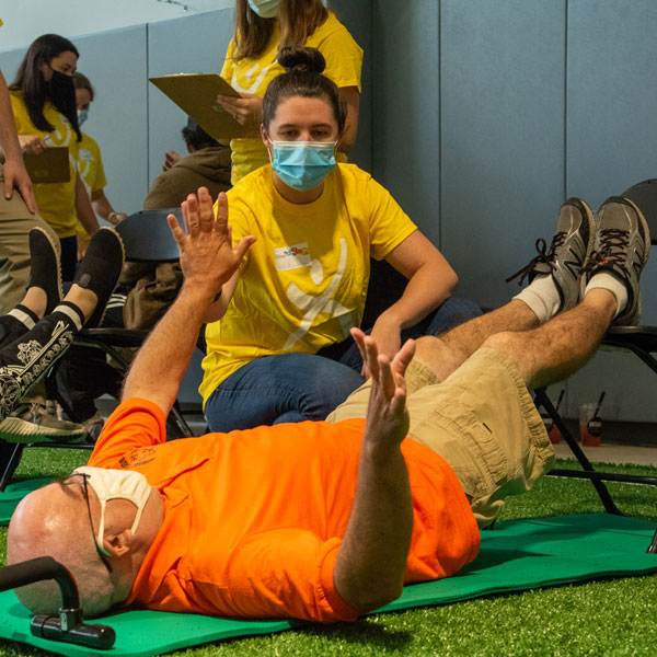 Physical therapy students work with Special Olympics athletes at Golisano Training Center on campus