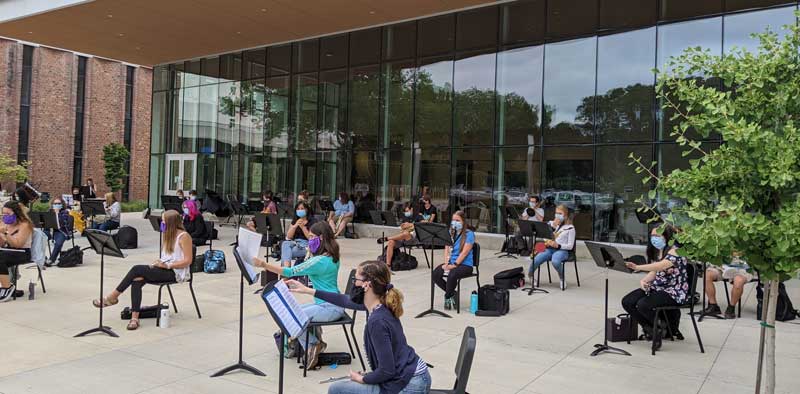 ensemble rehearsal outside of Glazer