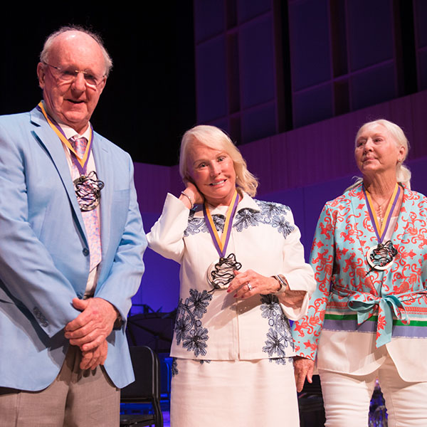 members of the Linehan and Wilmot families wearing medallions