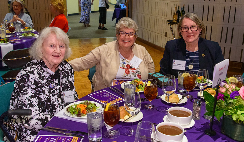 Three members of the 51+ club pose for a photo