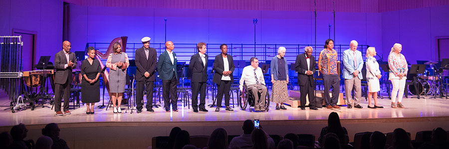 Presidential medallion-recipients on stage