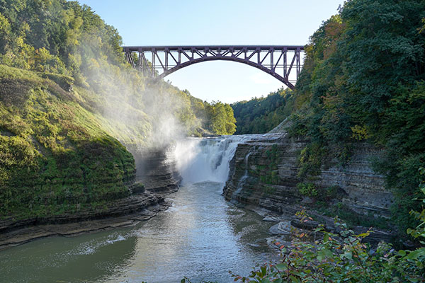 bridge over waterfall in Letchworth State Park