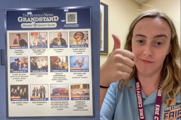 Annika Goeller gives a thumbs up next to a poster she designed that's on the wall