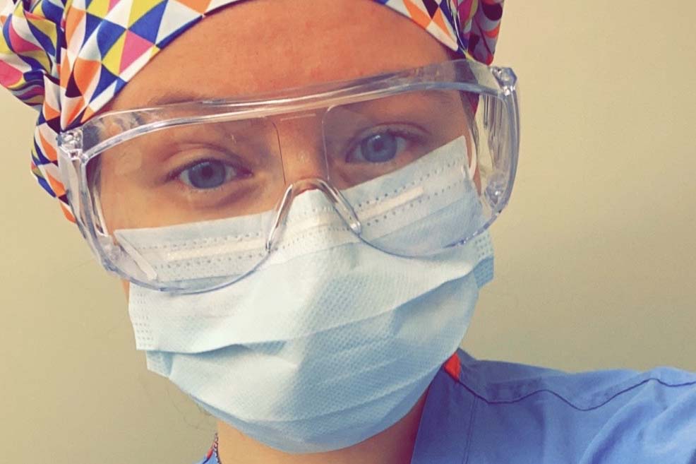 Alum Autumn Bell wearing surgical mask