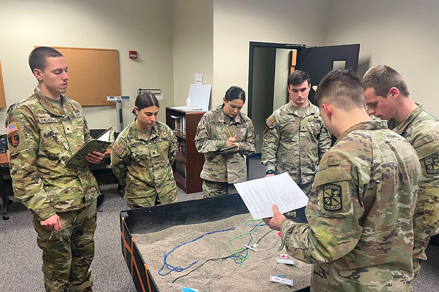 army soldiers observing sand pit