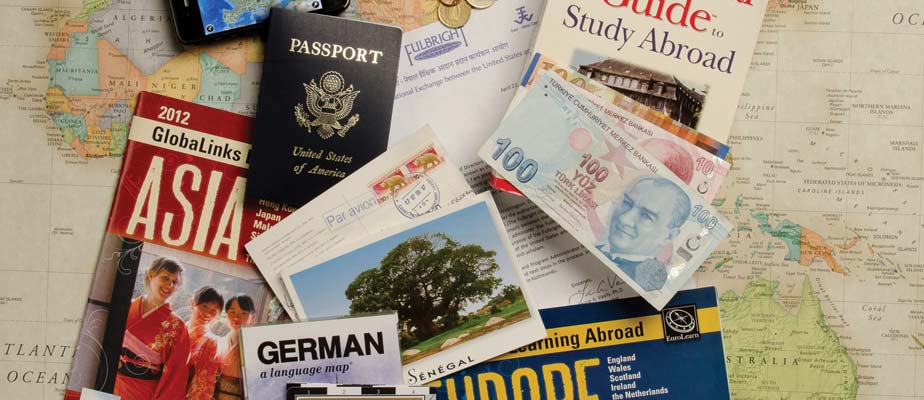 world map, passports, and currency