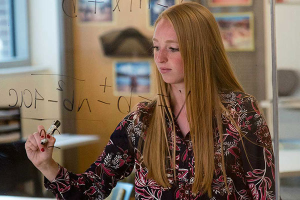 Laura Herman '18 works on math problems