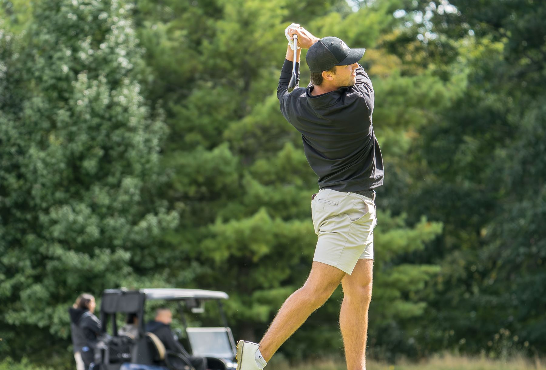 Man playing golf