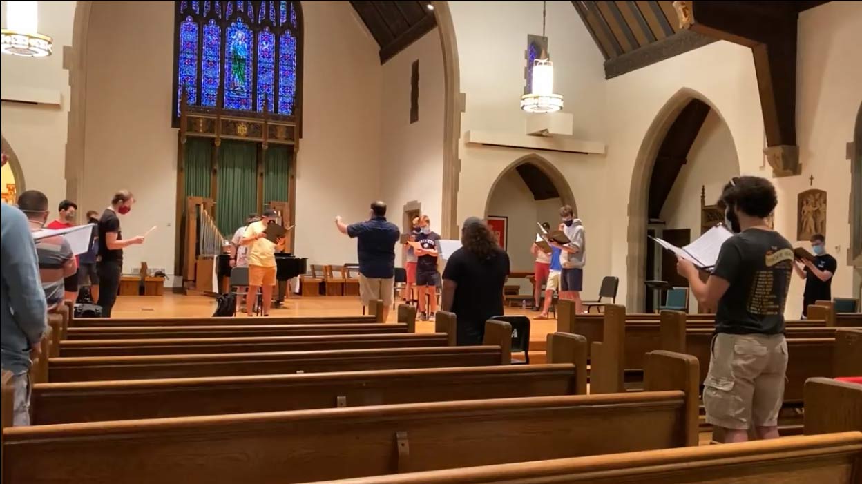 Tenor/Bass Chamber Choir sings, masked and spread out in chapel