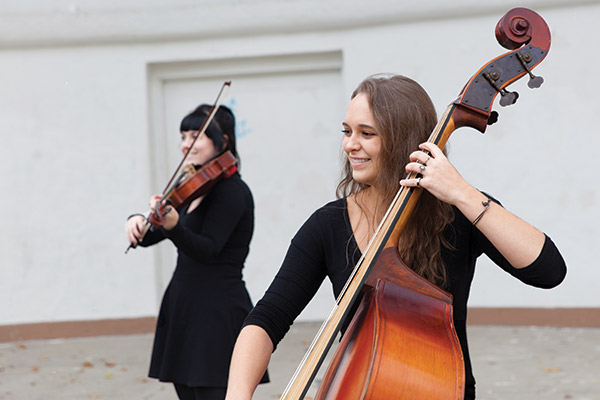 student musicians playing a violin and cello
