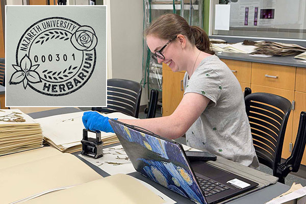 student in lab stamping document