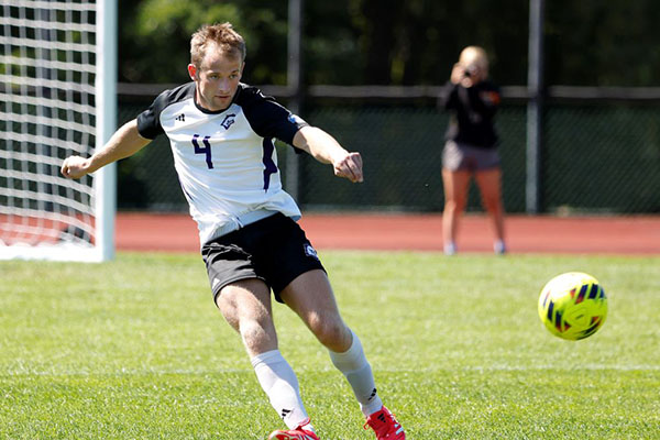 soccer player approaching ball