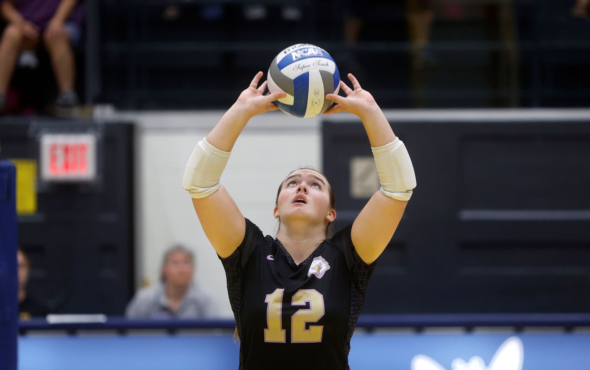 Woman setting volleyball