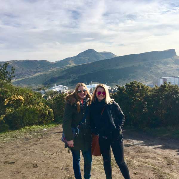 Olivia Figiel with mountains behind, while studying abroad