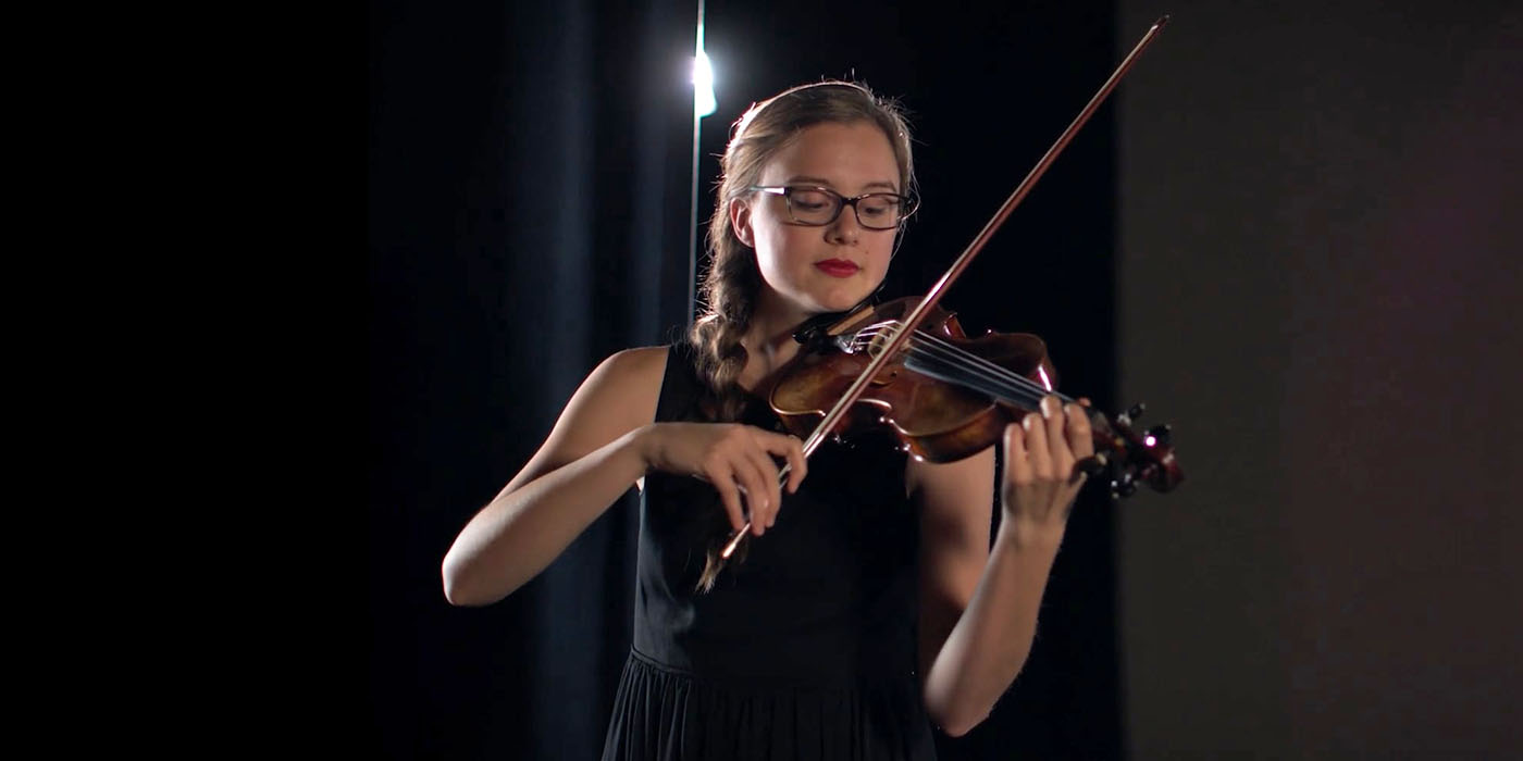 student playing violin