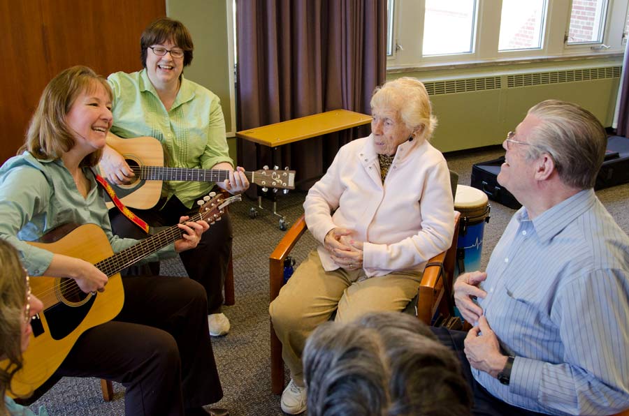Keough facilitates a music therapy session at Nazareth.