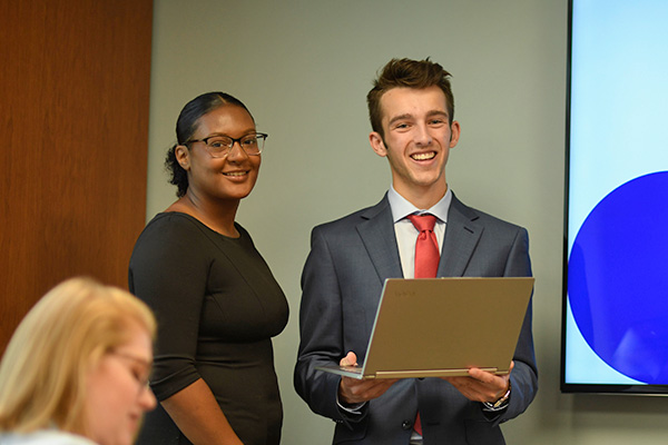 two business students conducting a meeting