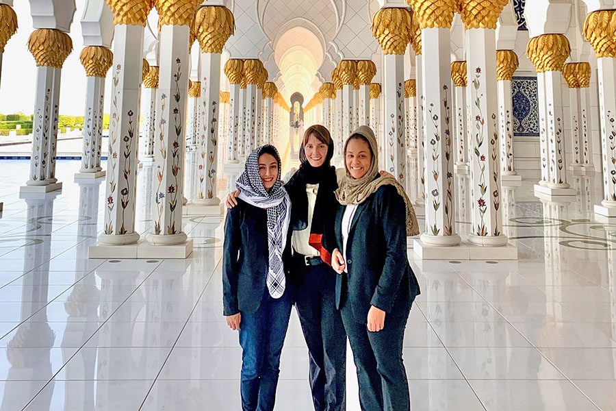 Gabriela Pandya with fellow agents at Grand Mosque in Abu Dhabi