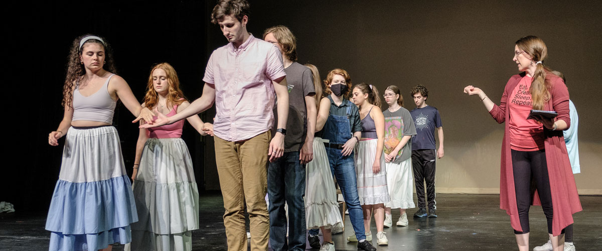 dance students rehearsing on stage