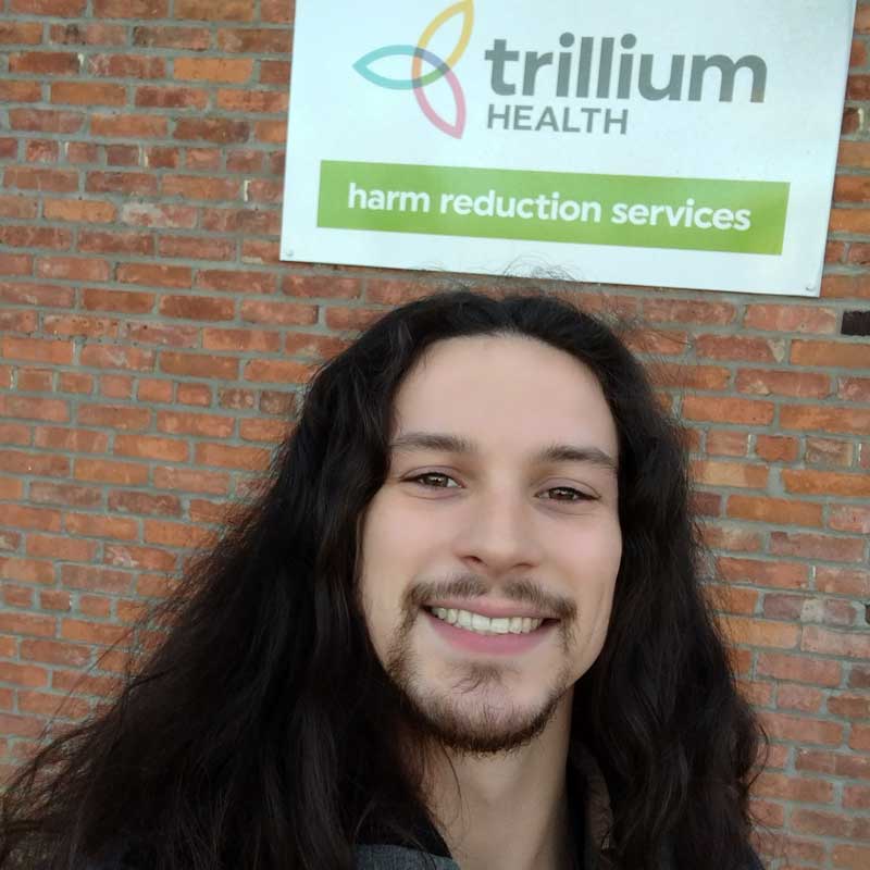 Ian Bankes selfie outside Trillium Health, where he was hired