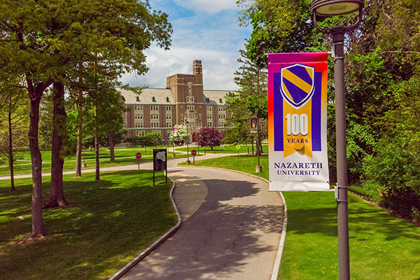 centennial banner in front of Golisano Academic Center