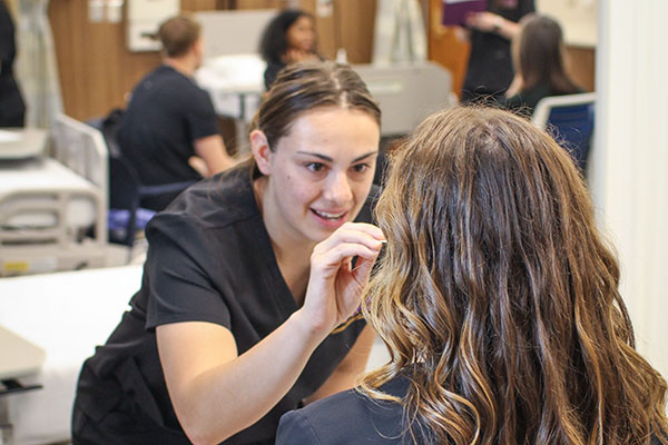 PA student taking a cheek swab