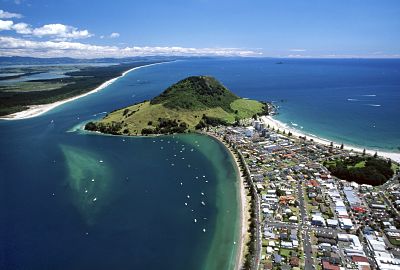 a New Zealand peninsula with bright blue water on each side