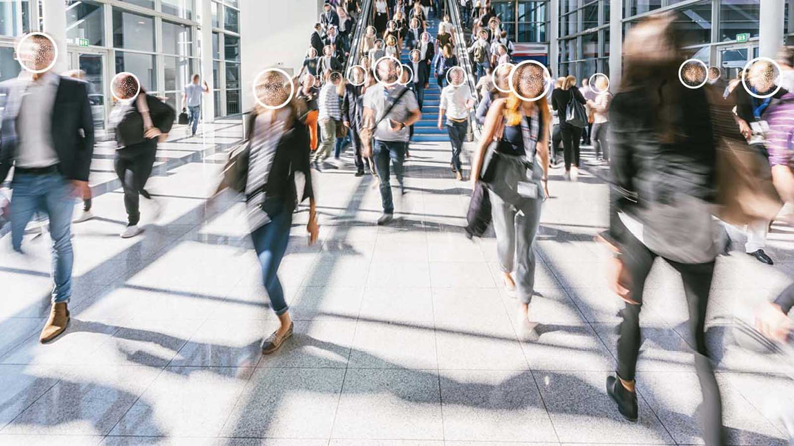 blurred crowd with facial recognition technology